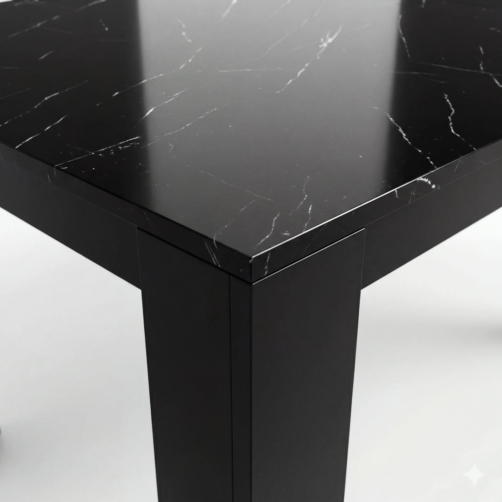 [6 Seater | Black] Close-up of the Milo black marble-effect tabletop edge, surface texture, and inverted-L shape leg