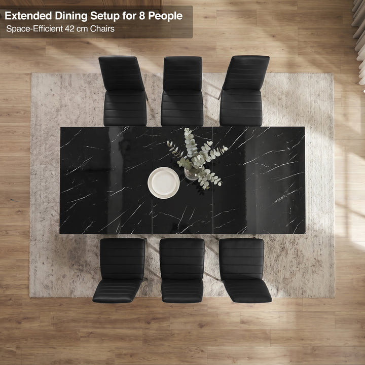 [6 Seater | Black] Overhead view of the Milo black marble-effect extended dining table layout with space-efficient chairs