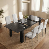 [6 Seater | White] Milo black marble-effect table partly opened to show the centre extension leaf and sliding rails