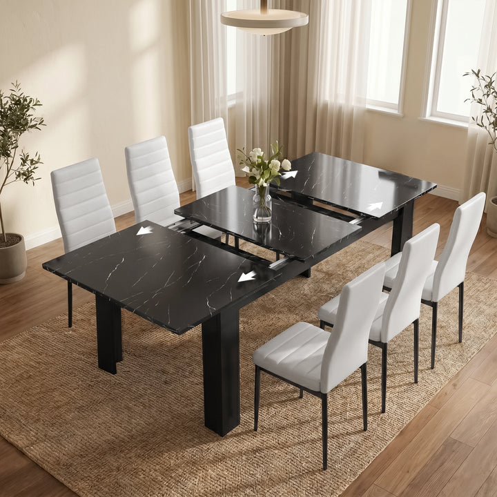 [6 Seater | White] Milo black marble-effect table partly opened to show the centre extension leaf and sliding rails