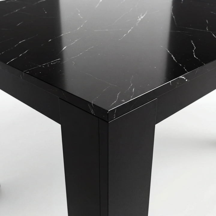 [8 Seater | Black] Close-up of the Milo black marble-effect tabletop edge, surface texture, and inverted-L shaped leg