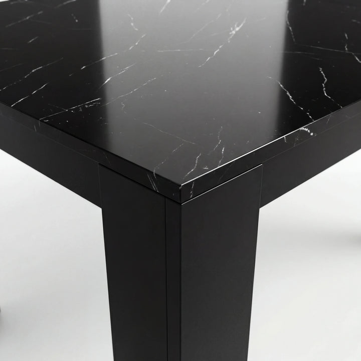 [8 Seater | Grey] Close-up of the Milo black marble-effect tabletop edge, surface texture, and inverted-L shaped leg