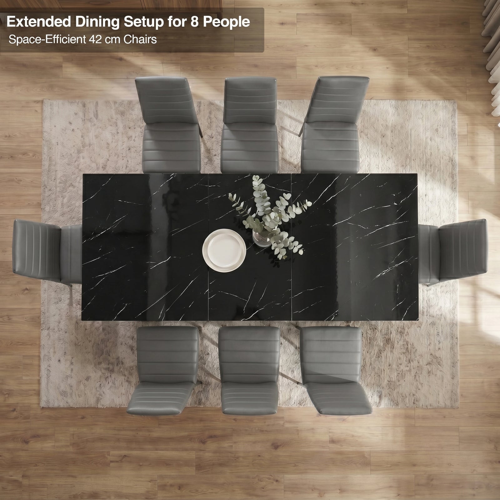 [8 Seater | Grey] Overhead view of the Milo black marble-effect extended dining table layout with space-efficient chairs