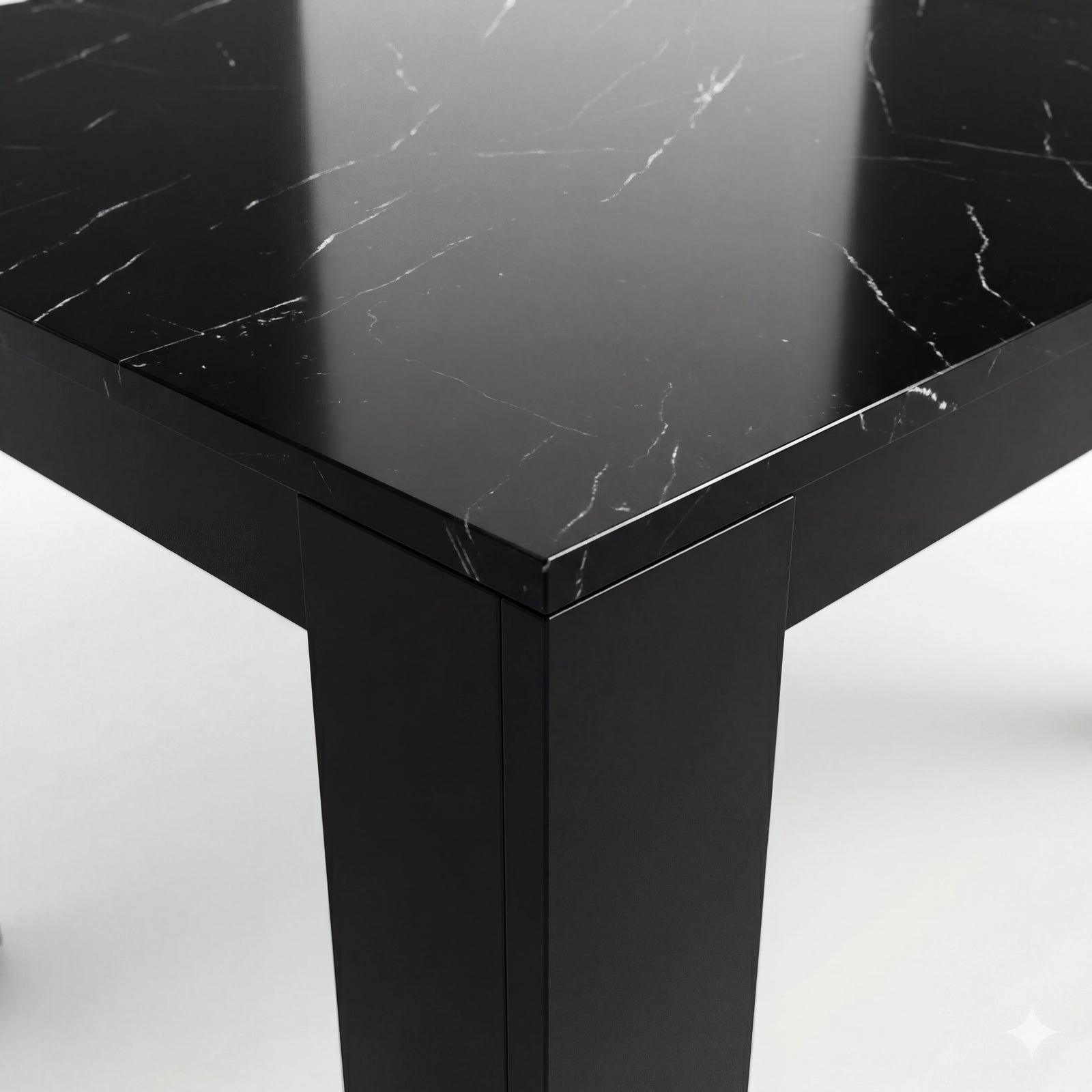 [8 Seater | White] Close-up of the Milo black marble-effect tabletop edge, surface texture, and inverted-L leg