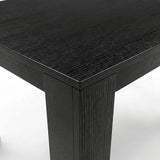 [6 Seater | White] Milo extendable dining table set corner close-up with textured tabletop and inverted L-shaped leg