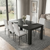 [6 Seater | White] Milo extendable dining table set at regular size with six white chairs, plates, and vase on tabletop
