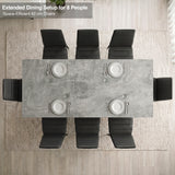 [8 Seater | Black] Milo concrete-effect dining table extended for 8, overhead view with high-back chairs