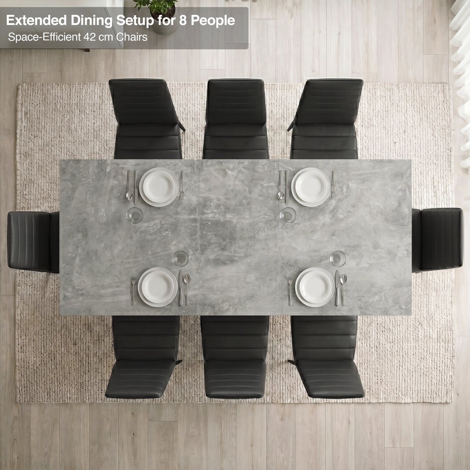 [8 Seater | Black] Milo concrete-effect dining table extended for 8, overhead view with high-back chairs