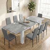 [8 Seater | Grey] Milo concrete-effect table partly opened to show the centre leaf and sliding rails