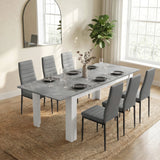 [6 Seater | Grey] Milo Extendable Dining Table Set with 6 Grey Chairs | Concrete Effect styled beautifully in a bright dining room on a woven rug.