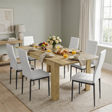 [6 Seater | White] Milo oak-effect dining table set with 6 high-back chairs in a styled room view
