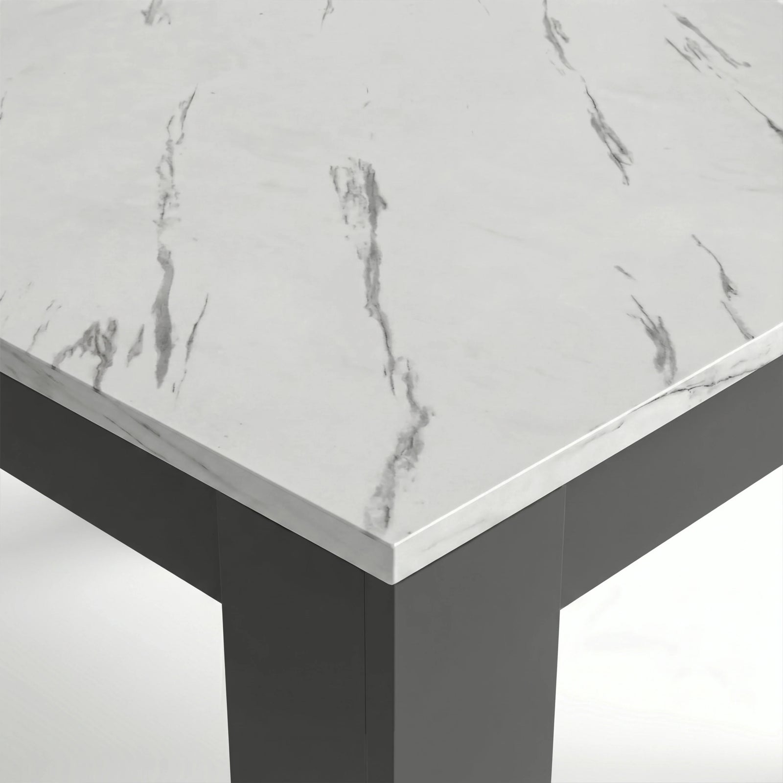 [6 Seater | White] Close-up of the Milo marble-effect tabletop corner, veining, and inverted L-shaped table leg