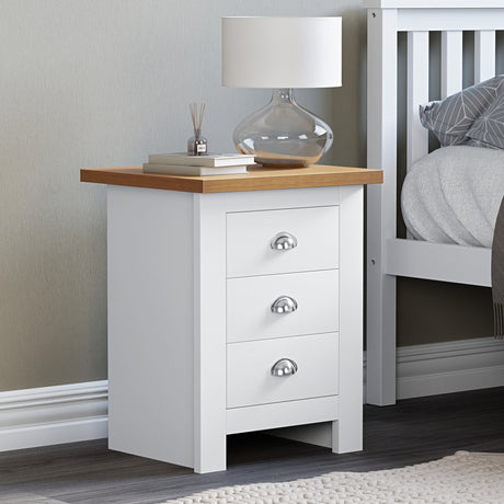 Mini bedside table with handles, perfect for compact spaces and practical storage.

