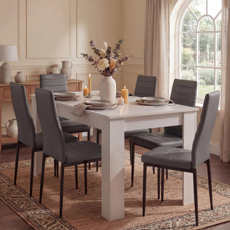 [6 Seater | Grey] White 6 seater table with six grey PU chairs in panelled chandelier-lit room