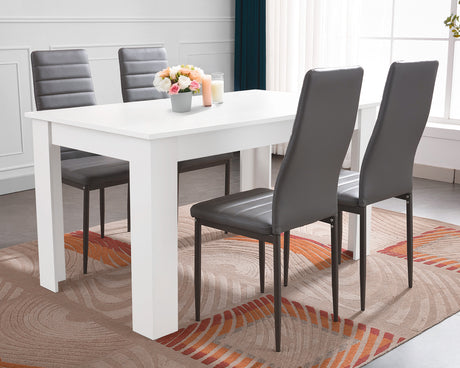 Modern dining table with stylish chairs, ideal for contemporary dining rooms.