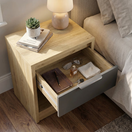 [Oak+Grey] Modern oak bedside table grey drawer head-on with side table lamp and small plant on top