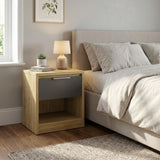 [Oak+Grey] Oak bedside table with grey drawer pulled open showing journal, glasses and accessories inside