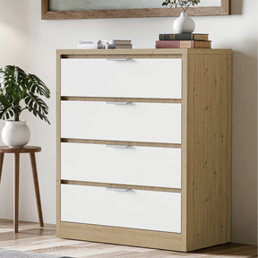 Oak White finish chest of drawers with four drawers, displayed in a room with decorative items on top