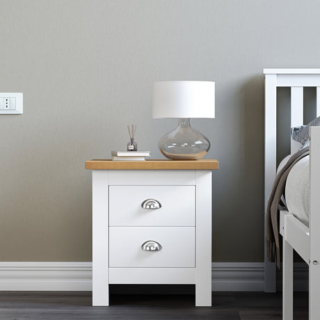 Modern white bedside tables with books and lamp on top stylish and functional for bedrooms