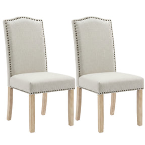 [Beige | Set of 2] Two upholstered dining chairs with light beige fabric, nailhead trim, and light wood legs on a white background.