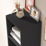 Top surface of black Blisswood bookcase with decorative items, ideal for compact modern interiors.