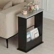 [Grey + Black] black body grey top slim side table between beige seating with flowers and books in slot