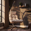[Natural] comfortable hanging egg chair with soft cushions and sturdy stand for cosy indoor lounging