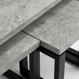 [Concrete] Nestline nesting coffee table showing grey stone-effect top meeting the square black metal support frame