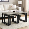 [Grey Oak] Nestline nesting coffee table in a bright lounge with cream sofa, vase stems, and nested sofa side tables below