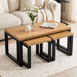 [Oak Effect] Nestline coffee table set beside a cream sofa, with flowers, books, and nesting side tables pulled outwards