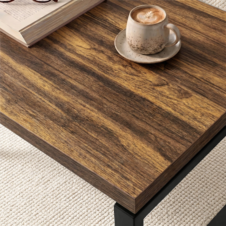 [Rustic] Nestline rustic nesting coffee table image showing tabletop detail with a small cup on warm brown grain and softly layered edge