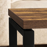 [Rustic] Nestline nesting coffee table detail with dark wood-effect edge and black metal leg corner connection
