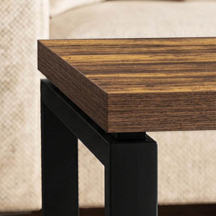 [Rustic] Nestline nesting coffee table detail with dark wood-effect edge and black metal leg corner connection