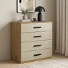 [Oak+Cashmere] Oak and beige 4-drawer storage chest with black handles styled with a table lamp and wall art in a modern home