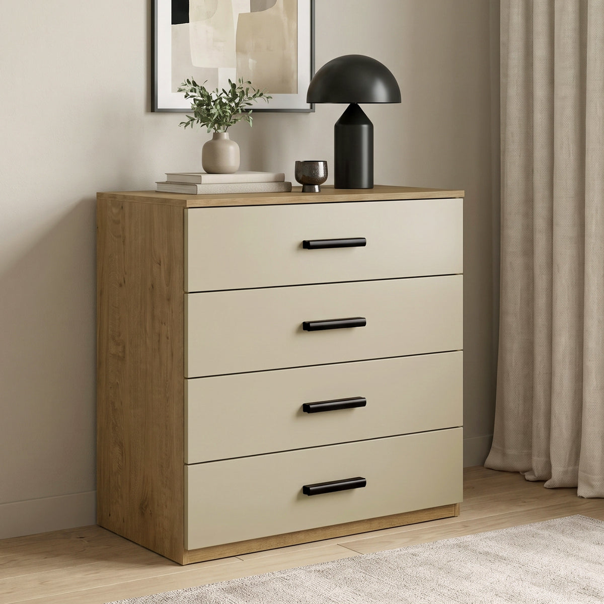 [Oak+Cashmere] Oak and beige 4-drawer storage chest with black handles styled with a table lamp and wall art in a modern home