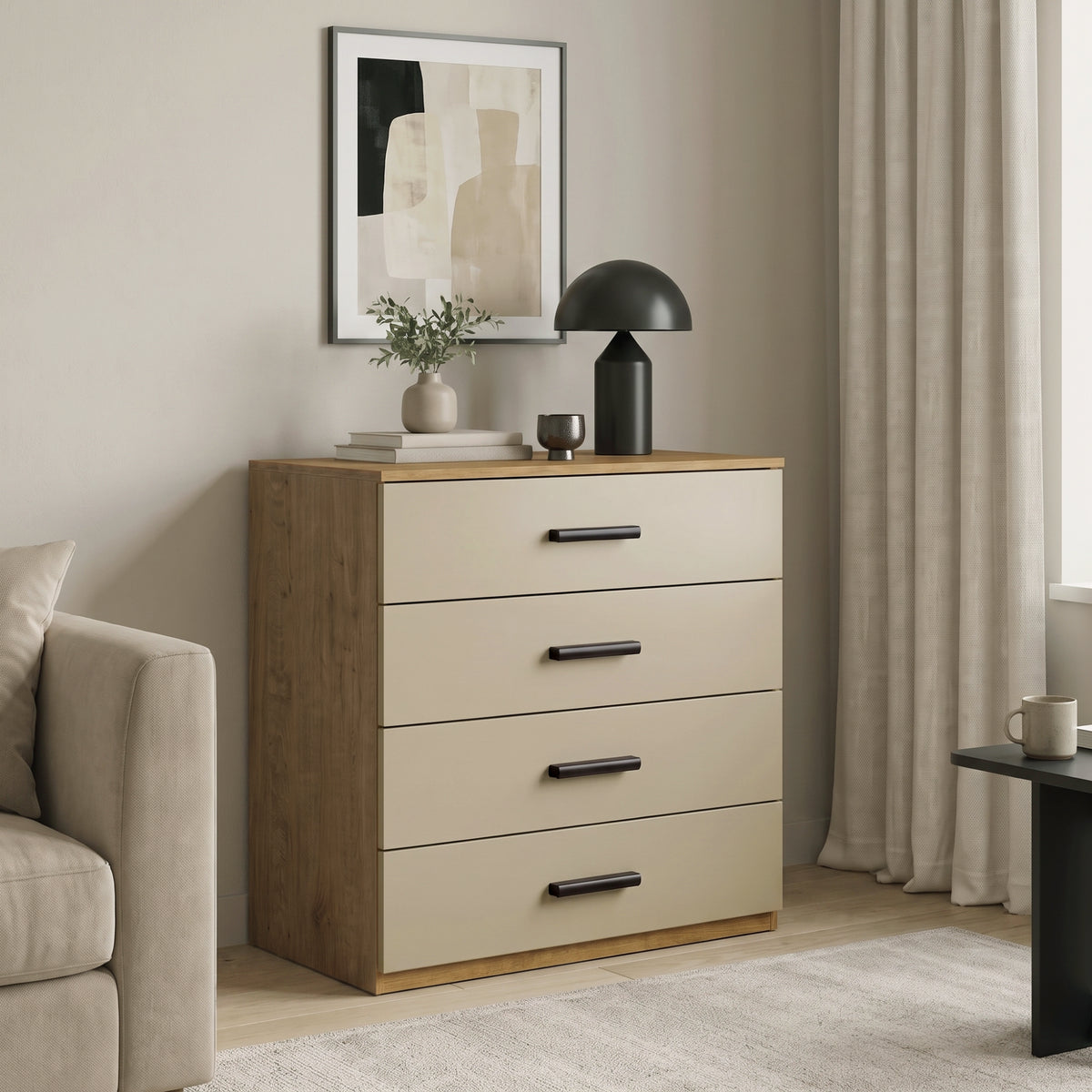 [Oak+Cashmere] Oak frame 4-drawer chest with beige drawers styled next to a cream armchair and table lamp in a living room