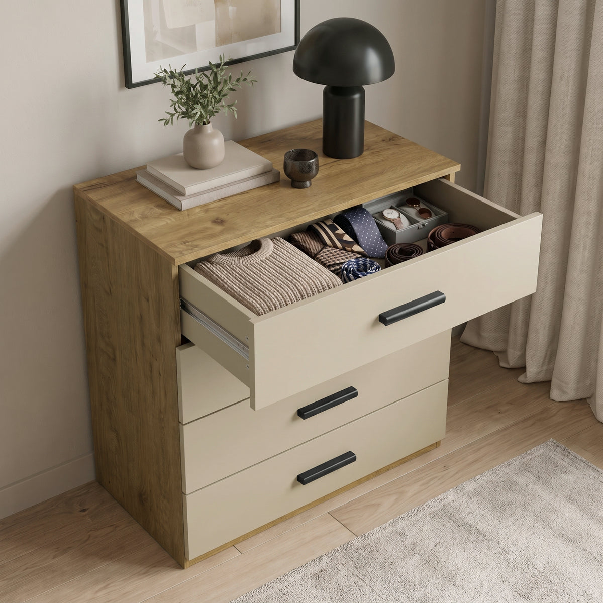 [Oak+Cashmere] Top-down angle of an oak and beige chest showing top drawer open with organised ties, belts, and folded clothing