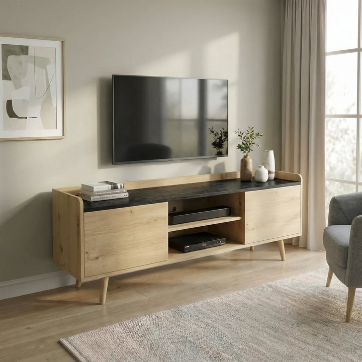 [Oak+Black] Living room view of TV unit with grey chair and large framed picture, eucalyptus vase on black top