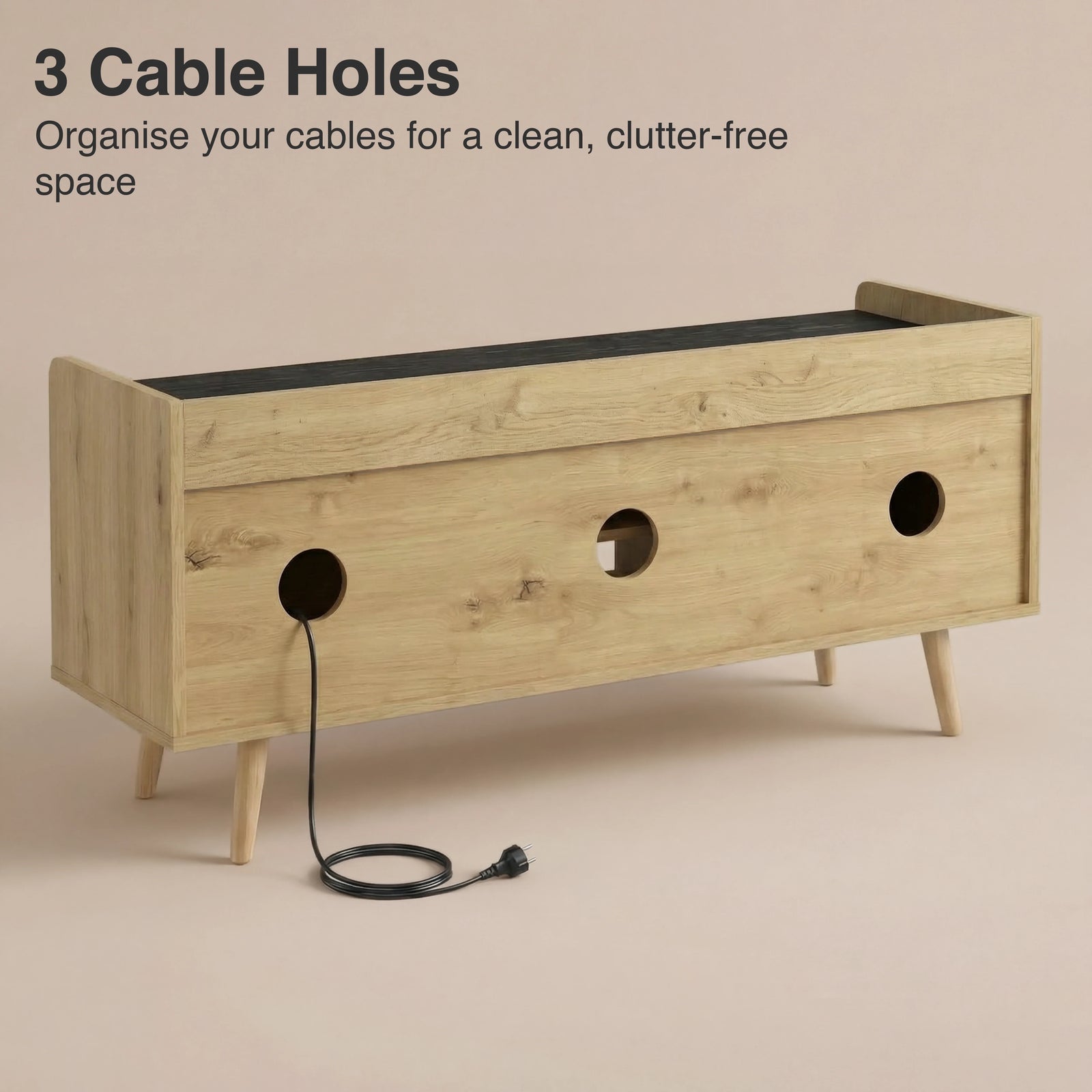 [Oak+Black] Rear of TV unit showing three round cable cut outs with black power cable threaded through middle hole