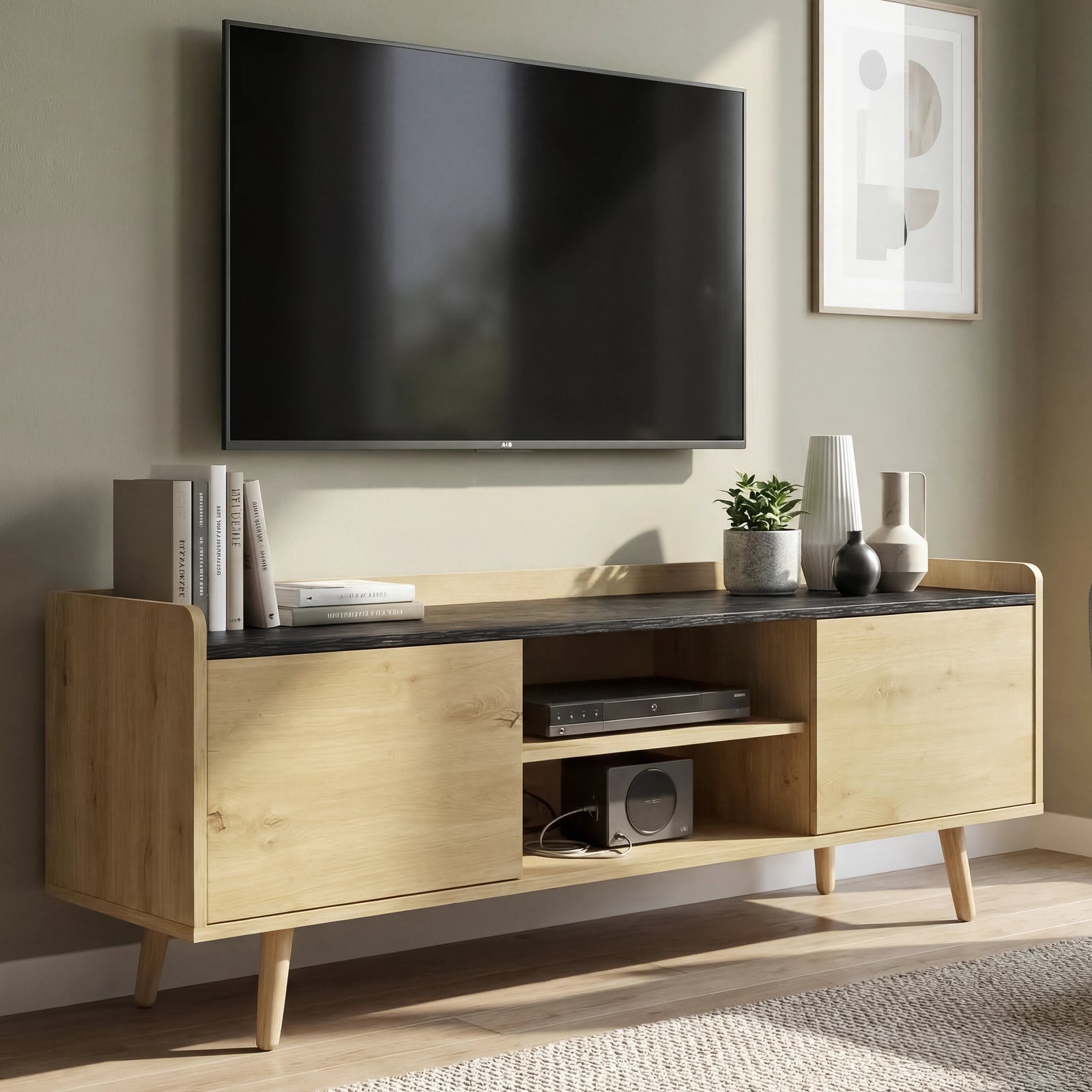 [Oak+Black] TV unit under wall mounted screen with central open shelf, two side cabinet doors and small plant on dark top