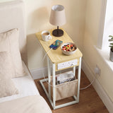 [Oak] Top view of C-shaped side table with oak-effect top, charging cable, phone and pouch used as bed side table