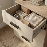 [Oak + Cashmere] Open drawer of oak and cashmere unit revealing internal storage space and runner mechanism detail