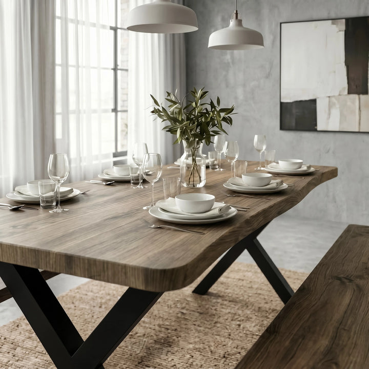 [Oak] Crosswick Industrial 6 Seater Dining Table with Benches front close-up showing laid table surface with place settings, botanicals and live-edge profile
