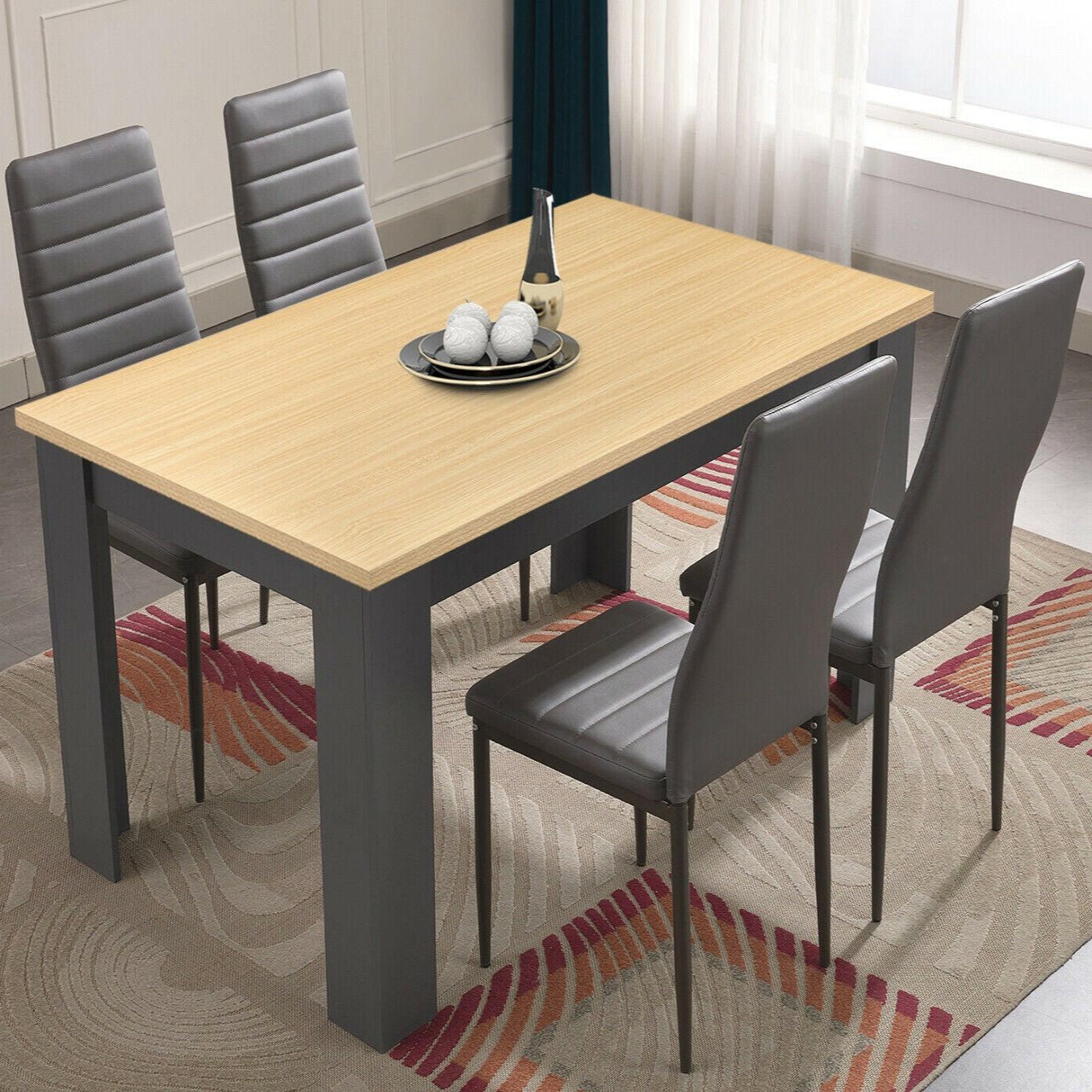 Oak dining table with grey chairs, a perfect combination of natural wood and modern style.