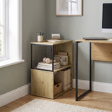 [Oak] This narrow side table stands beside a desk with stationery, headphones, books and storage boxes.