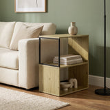 [Oak] This narrow side table stands beside a sofa with books and decor arranged on its open shelves.