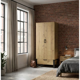 [Oak Effect] Rustvale wardrobe in bedroom with closed doors, lower drawer, brick wall, window, bed, plant, and bag.