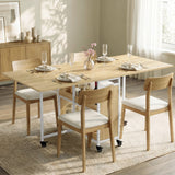 [Oak Effect] Stovra dining scene with oak effect table surface, white frame, central shelves, cupboard, and casters
