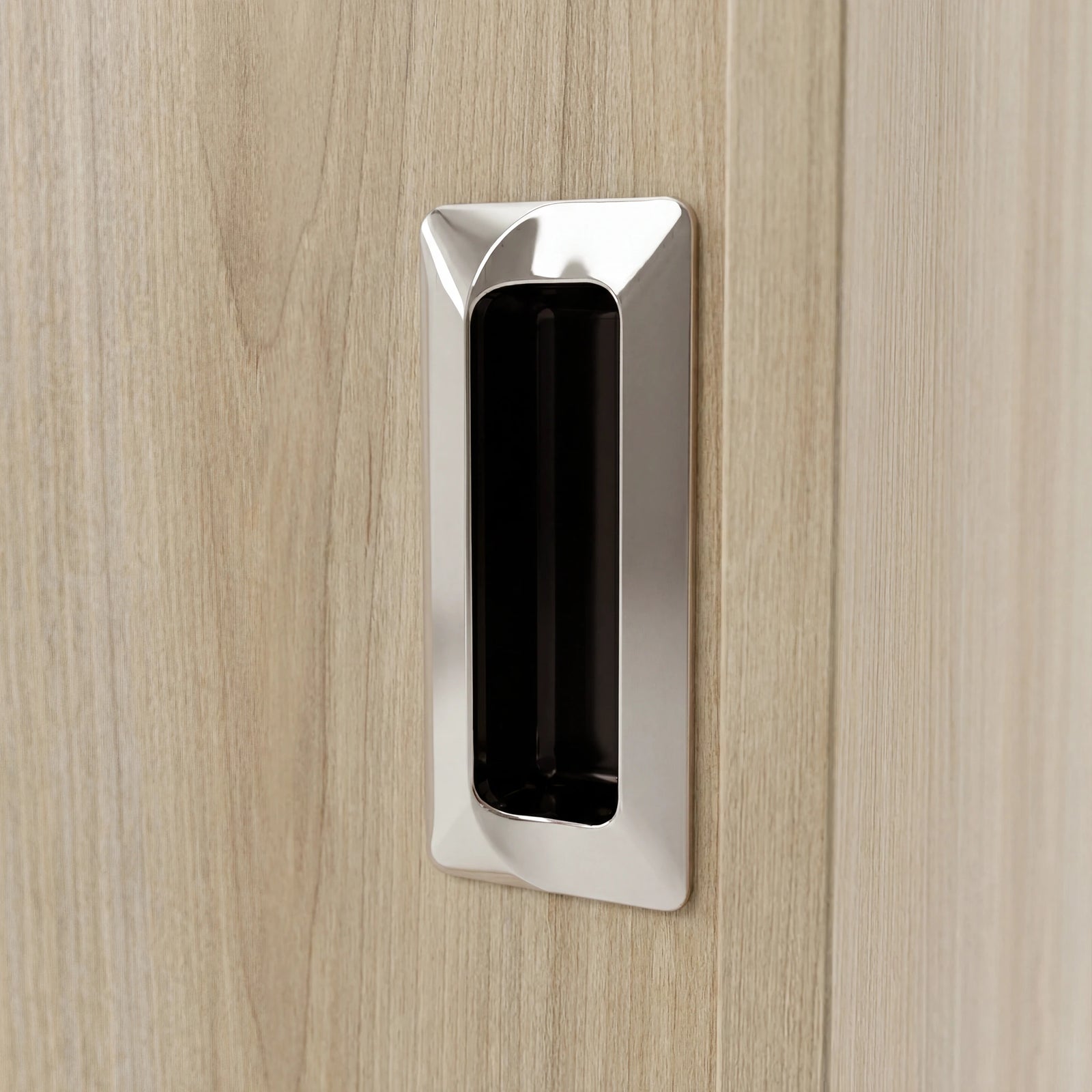 [Oak Effect] Torvek wardrobe close-up of polished metallic recessed rectangular flush handle on oak-effect door panel