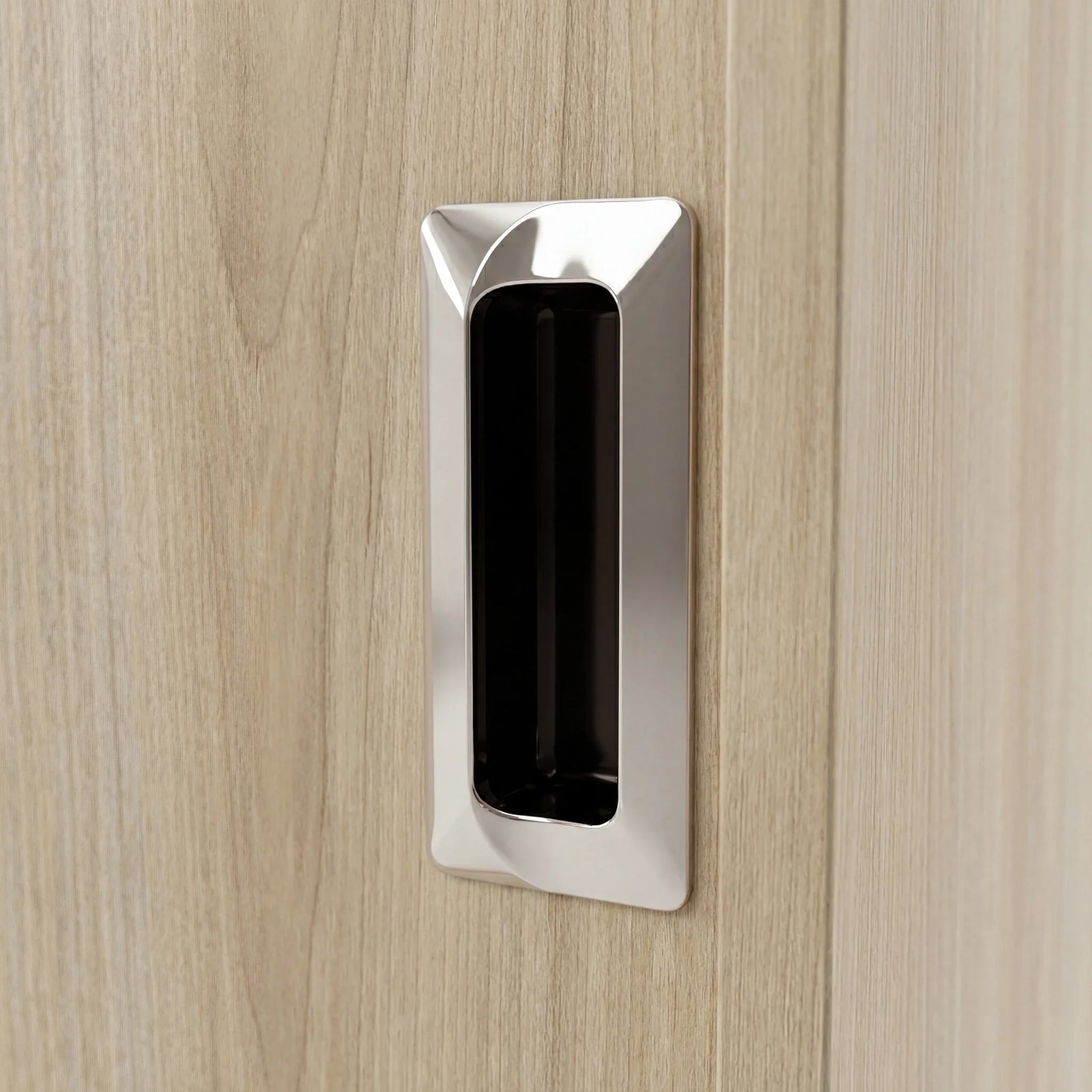 [Oak Effect] Torvek wardrobe close-up of polished metallic recessed rectangular flush handle on oak-effect door panel
